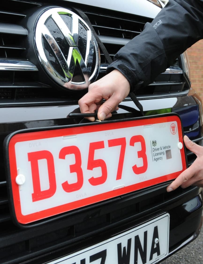 Trade plate service — a vehicle being prepared for movement.